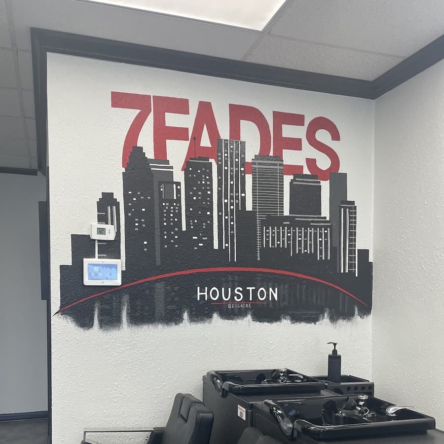 Houston skyline mural with the 7FADES logo on the shop wall